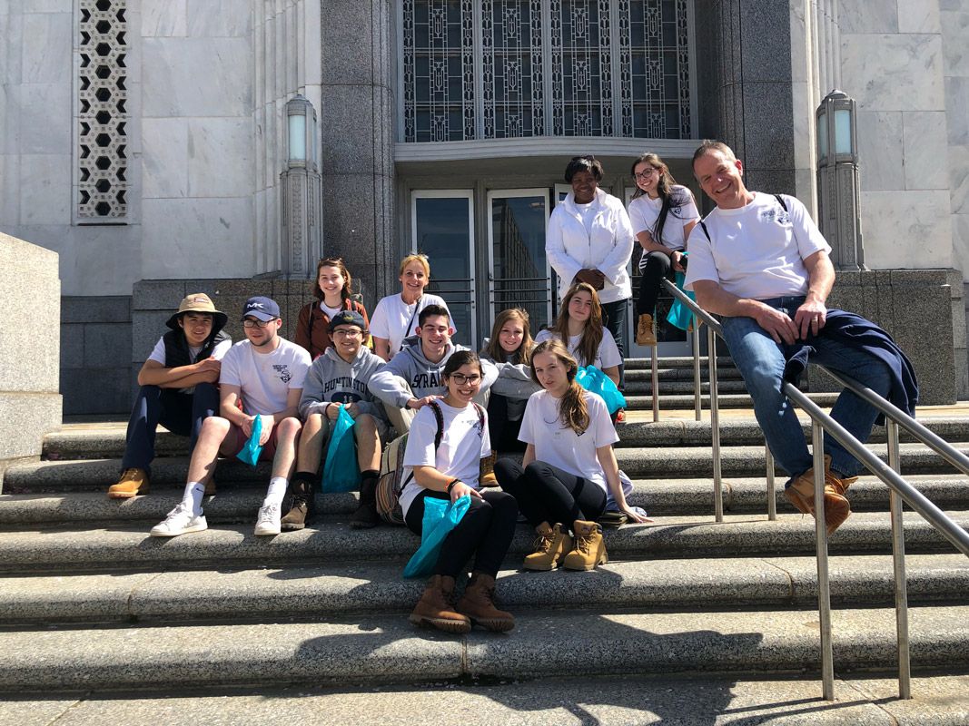 Kyle Chin (left in second to top row) on a trip with Habitat for Humanity club members.