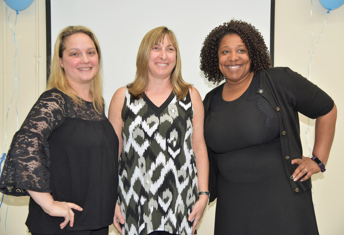 Huntington science research program teachers Lori Kenny, Deborah Beck and Dame Forbes.