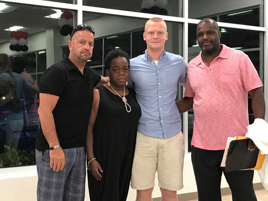 Young Leaders Vice President Henry Cartwright (second from left) with Kevin Zaharios, Sylvia Belanger Sr and Kevin Thorbourne.