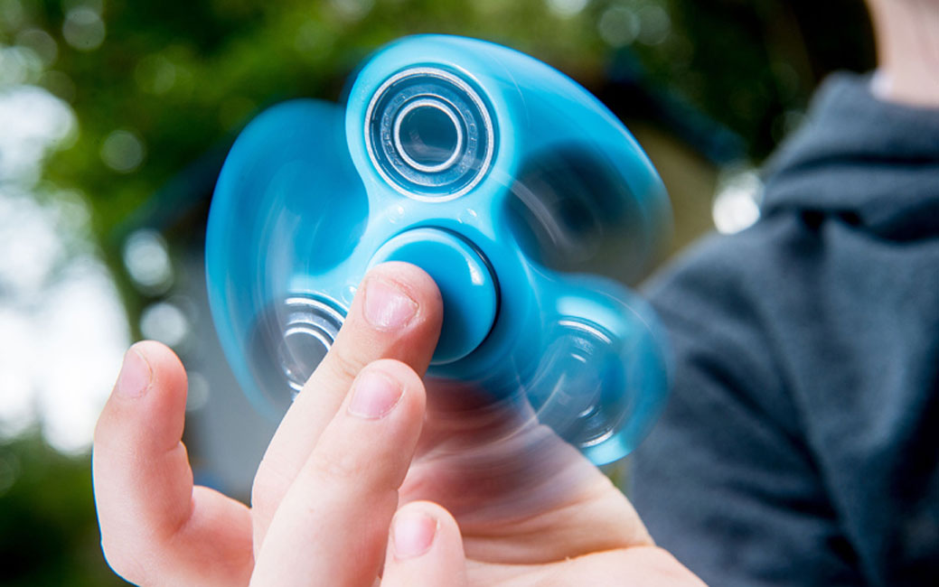 Fidget spinners were used at Washington School for a second grade math lesson.