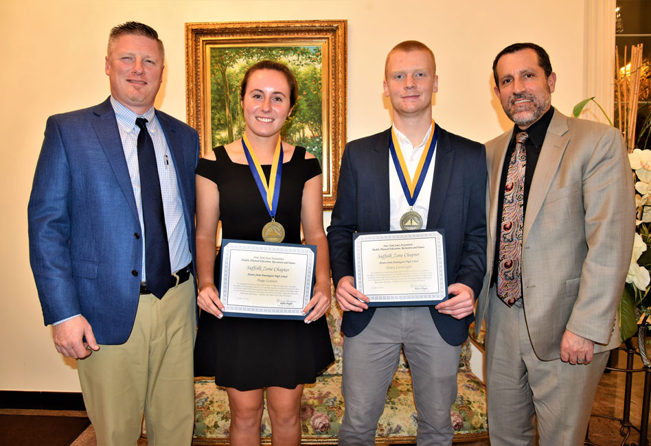 Suffolk Zone Award recipients Paige Lennon and Henry Cartwright are flanked by Principal Brenden Cusack and Superintendent Jim Polansky.