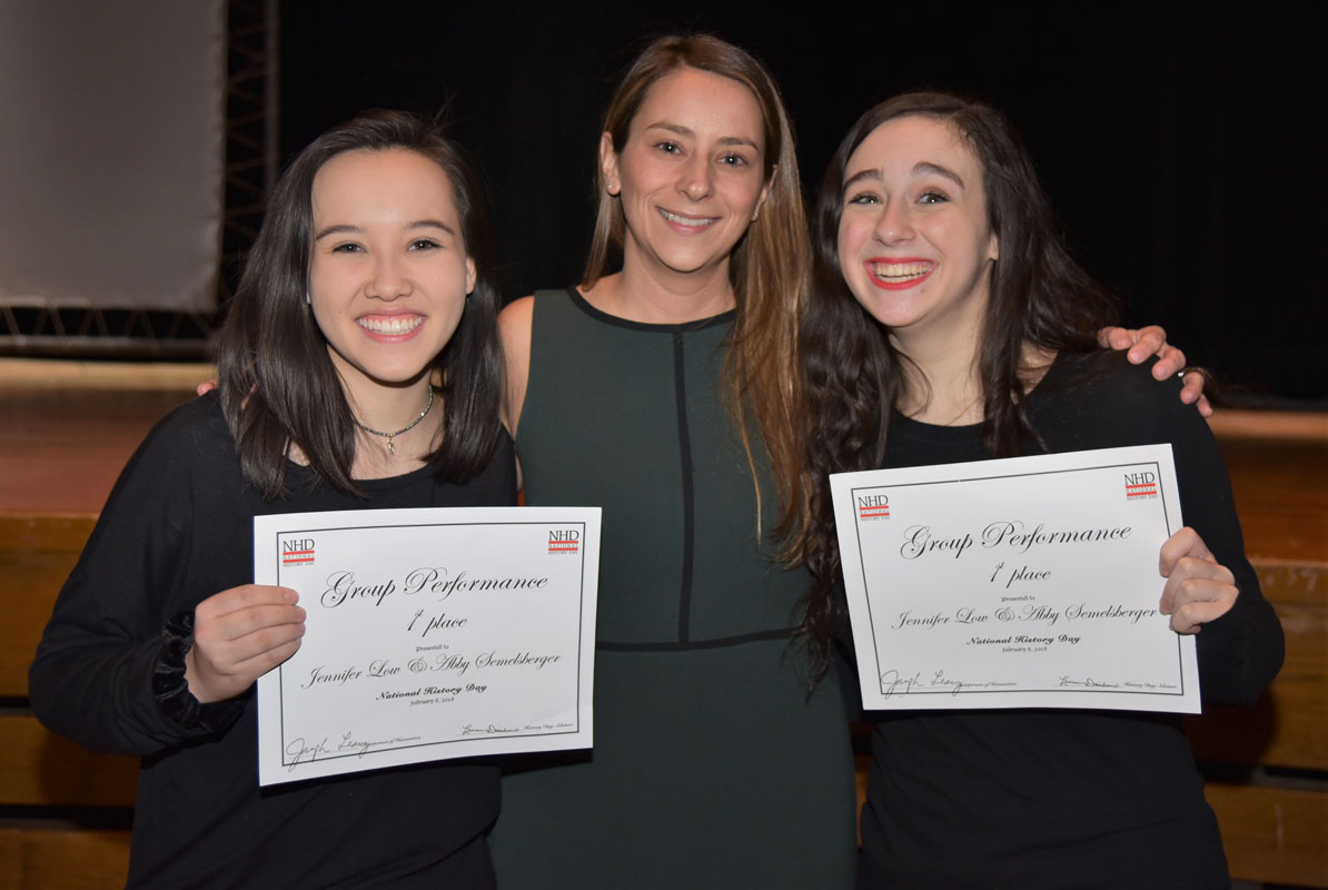 National History Day first place honorees Jennifer Low and Abby Semelsberger with teacher Lauren Desiderio.