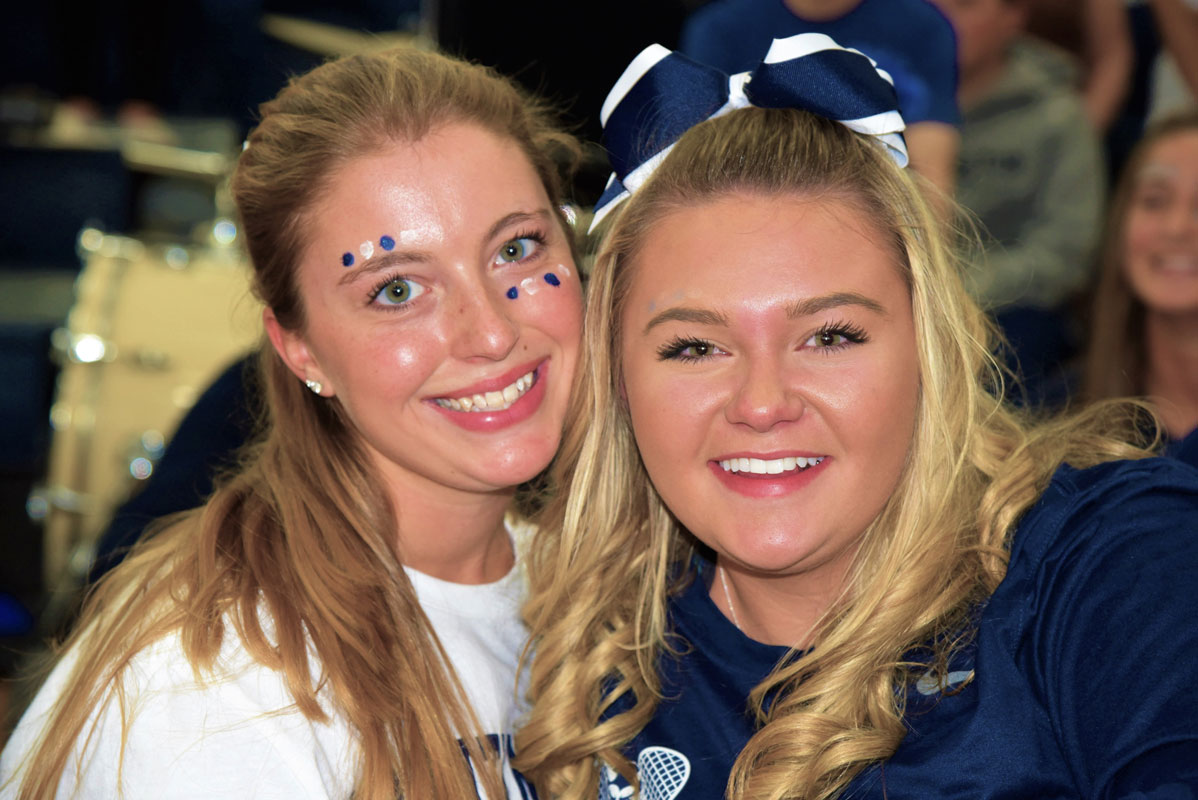 Christie Baade (right) with classmate and tennis teammate Cameron Fehrs.