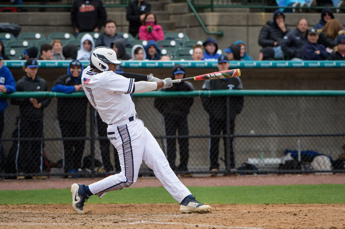 Elian Pimentel connects for Huntington. (Darin Reed photo) 