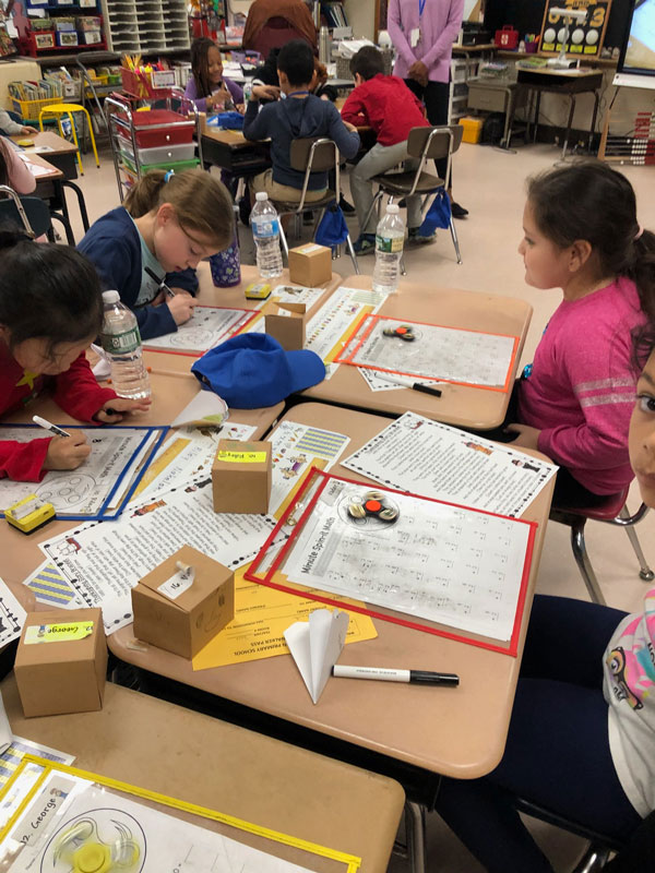 Washington School second graders used fidget spinners during a math lesson.