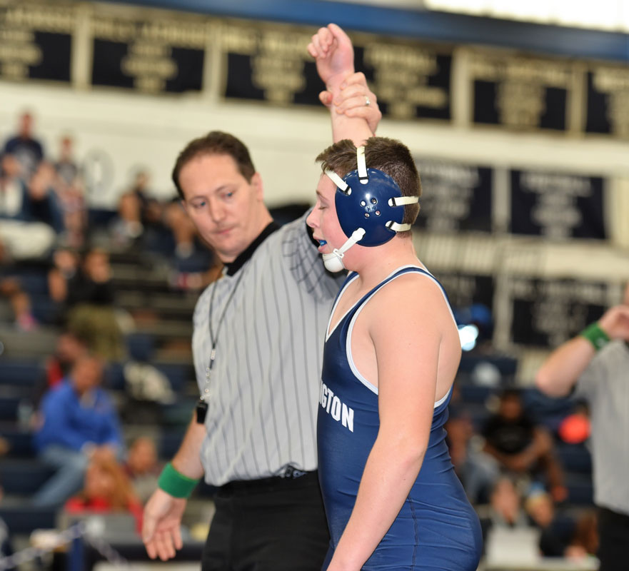 Huntington's Robbie Smith wins another match last winter.