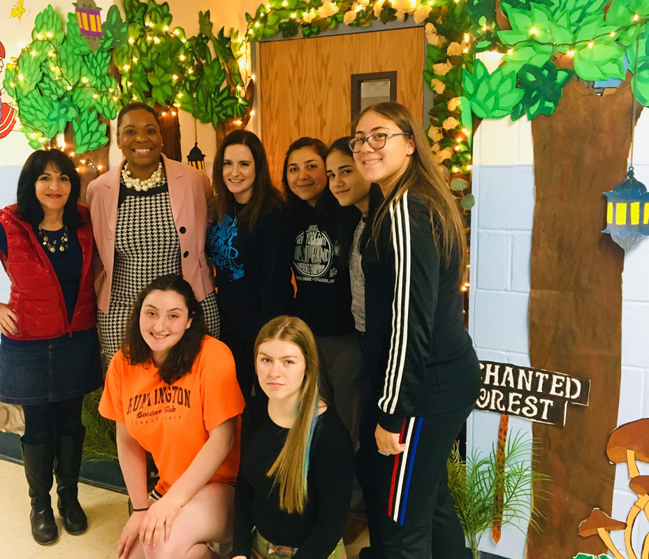 Art teacher Maria Mazzola, Principal Michelle Richard and AHS advisor Jane Judson with five exceptional high school artists. 