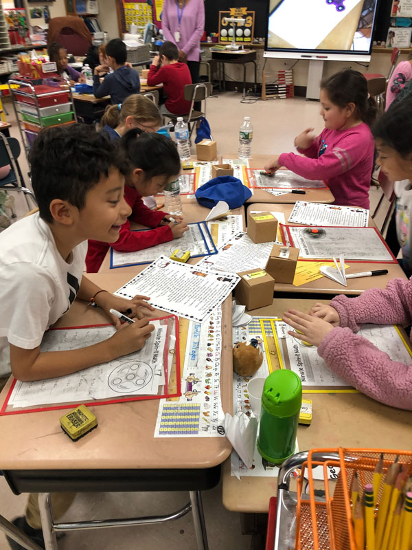 Washington School second graders used fidget spinners during a math lesson.