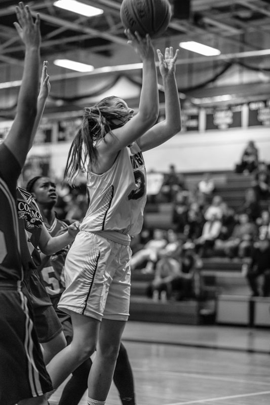 Abby Maichin goes to the basket. (Darin Reed photo.)
