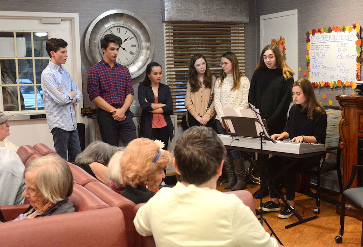 Isabella Cahill singing, Katherine DeGennaro on keyboard.