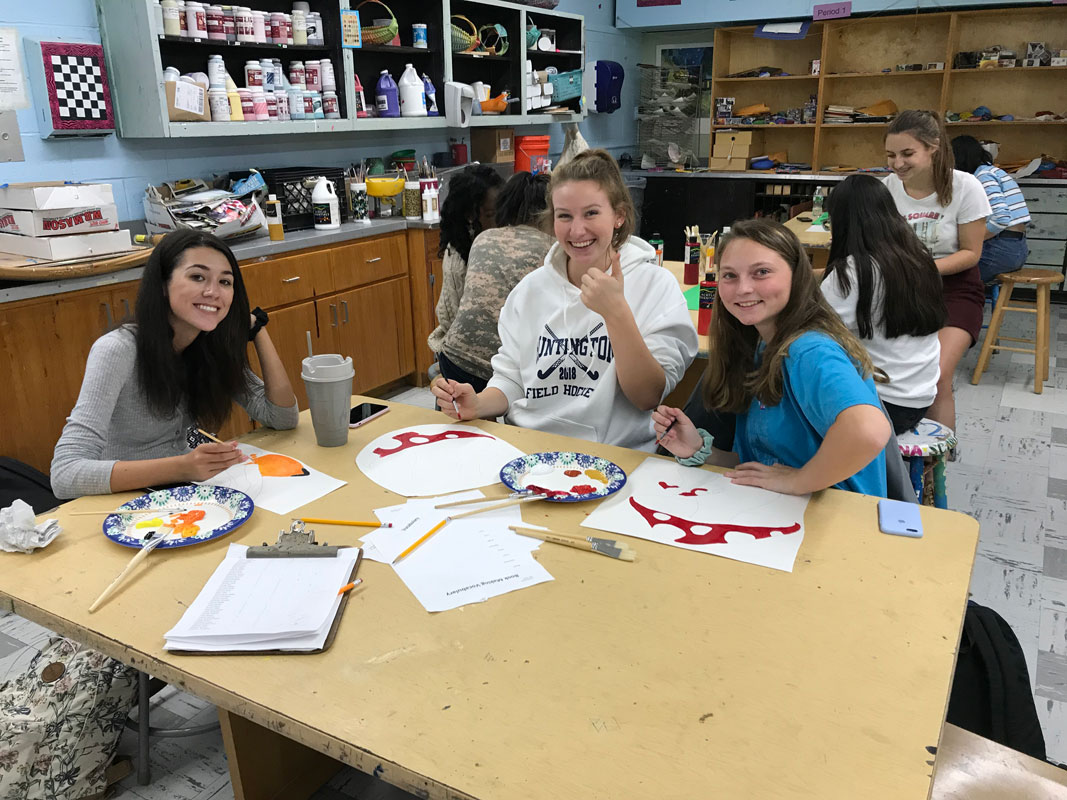 Huntington Art Honor Society members creating the artwork that was installed at Washington School.