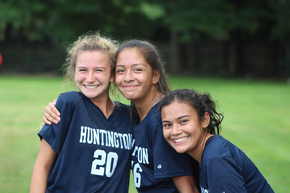 The Huntington JV girls' soccer team is filled with happy players. (Andy Ulloa photo.)