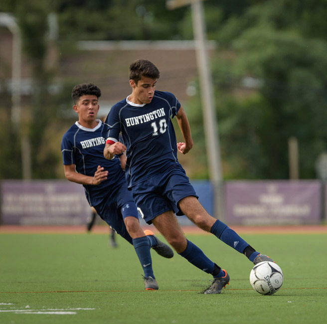 Eren Aydin scored the game winning goal in overtime against North Babylon. (Darin Reed photo.)