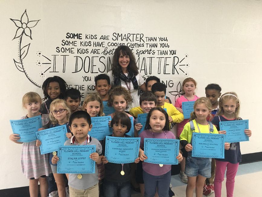 Flower Hill Primary School's September Star Student Award recipients with Principal Lucia Laguarda.