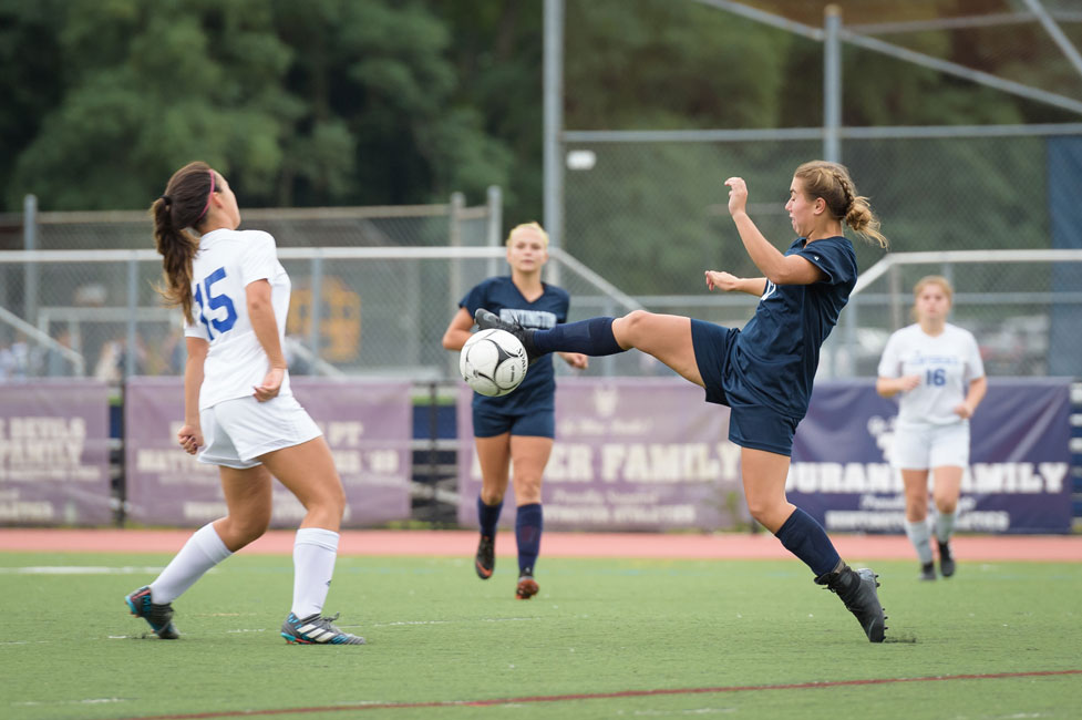 Marissa Stafford (right) in action for Huntington this fall. (Darin Reed photo.)