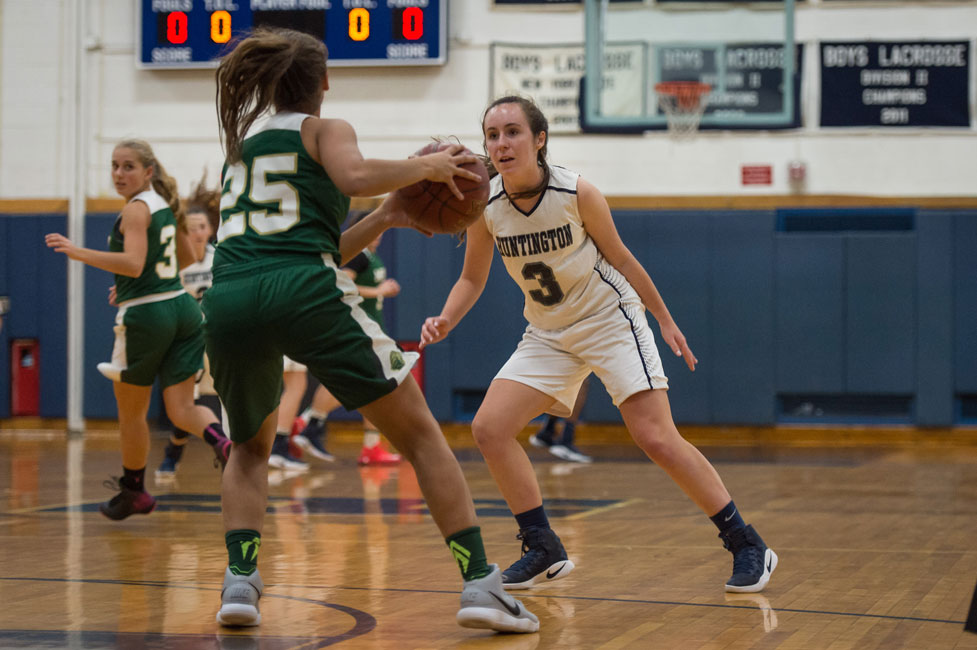 Paige Lennon (No. 3) goes one on one for the Blue Devils. (Darin Reed photo.)
