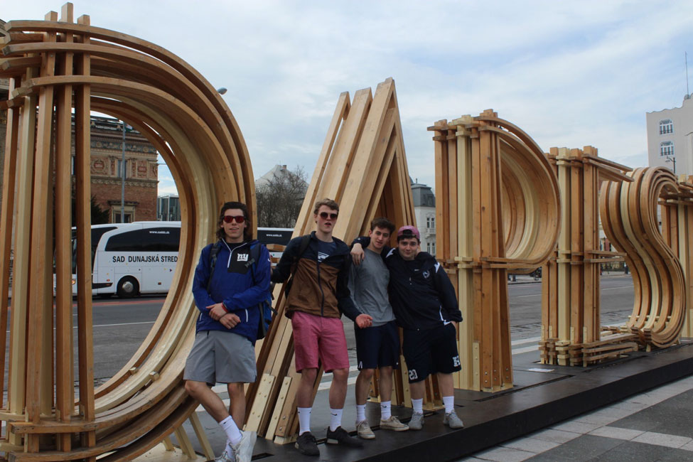 Christian Bellissimo (left) enjoys traveling. He's pictured here with his friends in Europe.