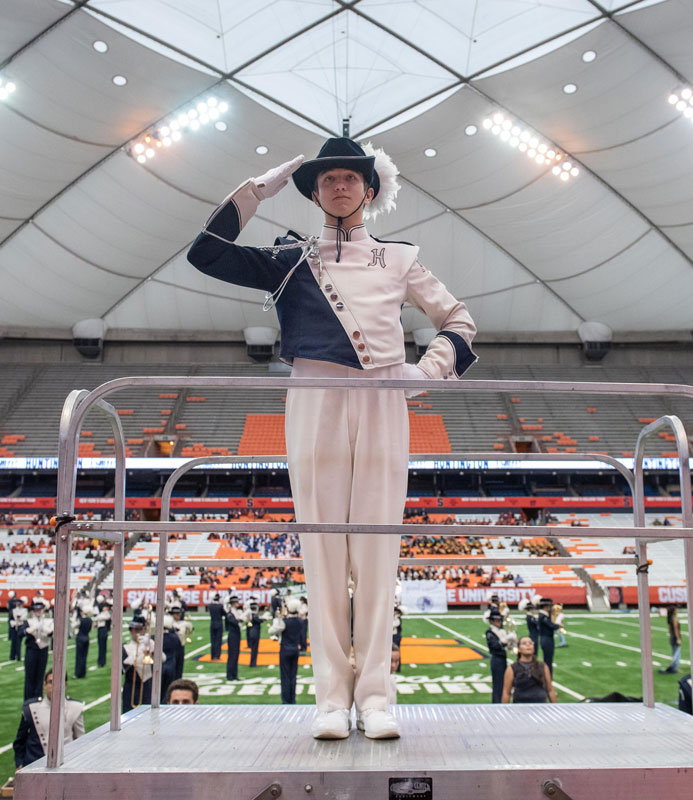 Drum major Mathew Hearl salutes the crowd and judges following the band's performance. (Darin Reed photo.)