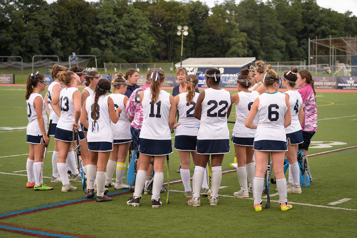 Coaches Allison Conlon and Kathy Wright give instructions to the Blue Devils. (Darin Reed photo.)