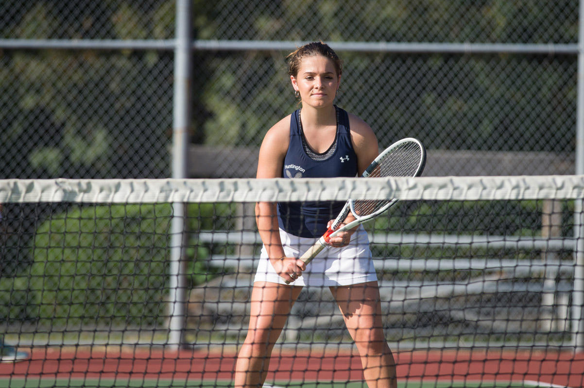 Ashlyn Case is ready at the net for the Huntington tennis team. (Darin Reed photo.)