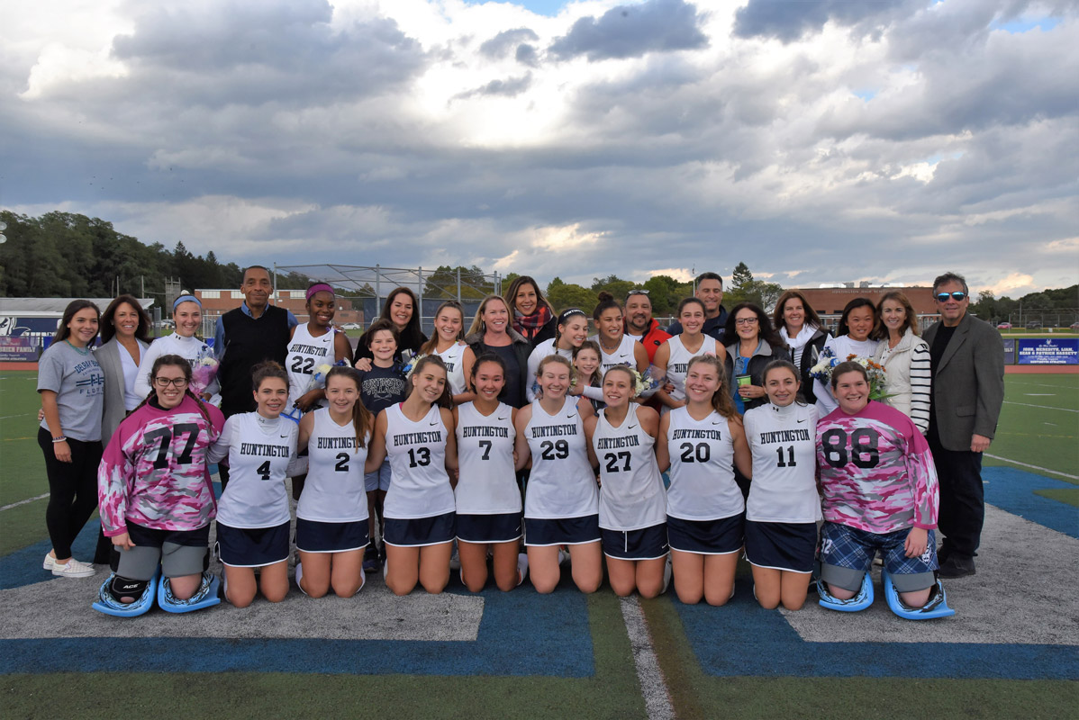 The 2018 Blue Devil field hockey team with family members of the senior players.