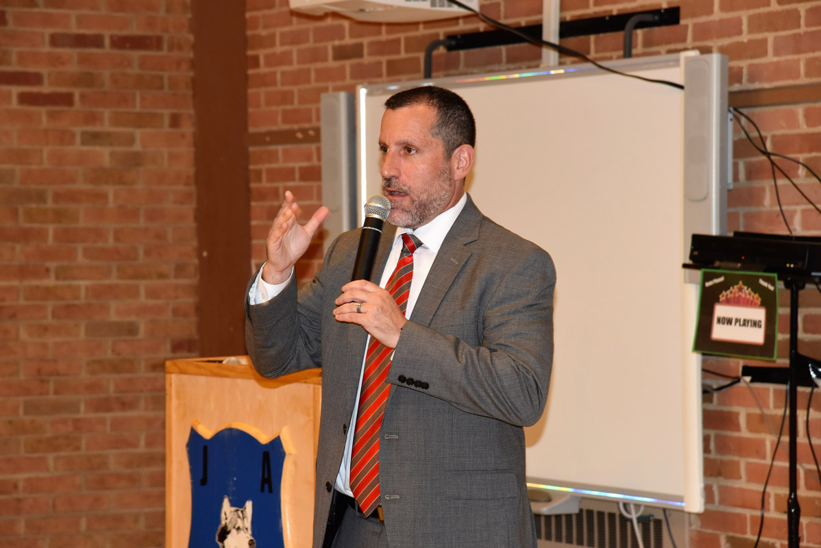 Huntington Superintendent James W. Polansky spoke about each of the five tenure recipients 