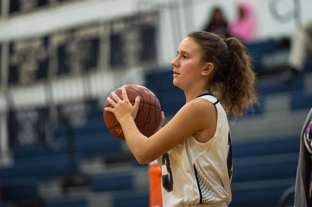 Alyssa Sorensen has the ball for the Blue Devil basketball team. (Darin Reed photo.)