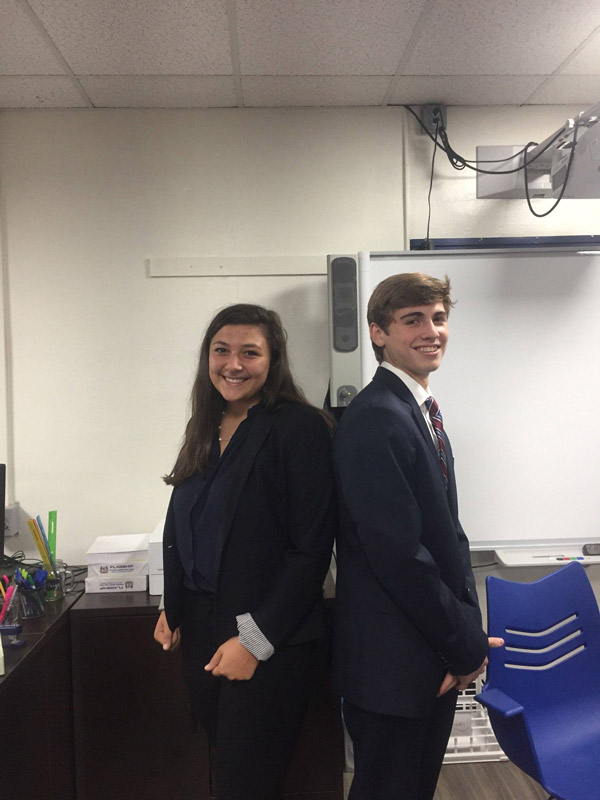Lena Annunziata and Ethan Mulroy are tops executives in a Virtual Enterprise class.