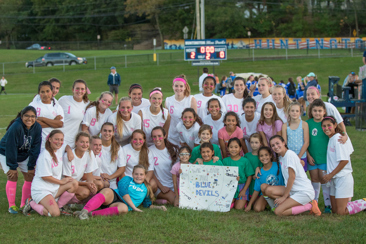 Kiara Rafailan (front row right)  at the Kicks for Cancer game in October 2017. (Mike Connell photo.)