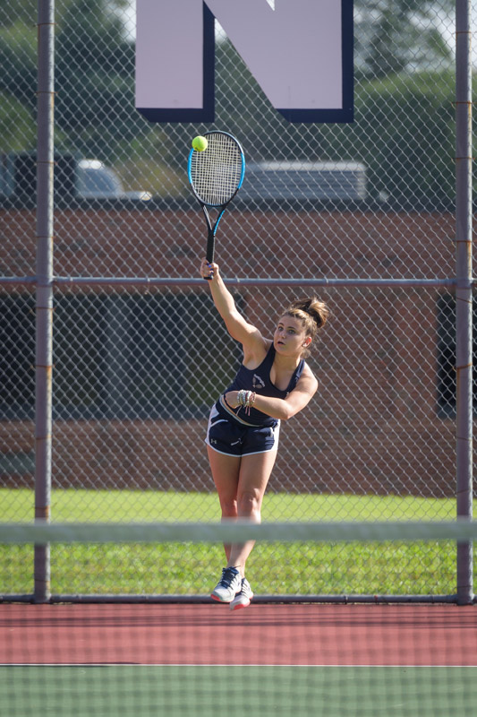 Mia Breitbarth at the serving line for the Huntington girls' tennis team. (Darin Reed photo