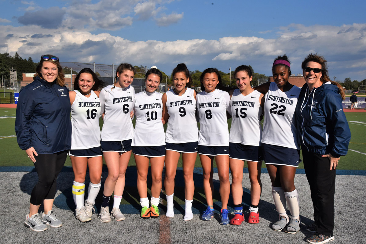 The seven Blue Devil field hockey seniors with coaches Allison Conlon and Kathy Wright.