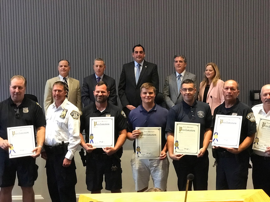 Chas Forte (center) was honored by the Huntington Town Board.