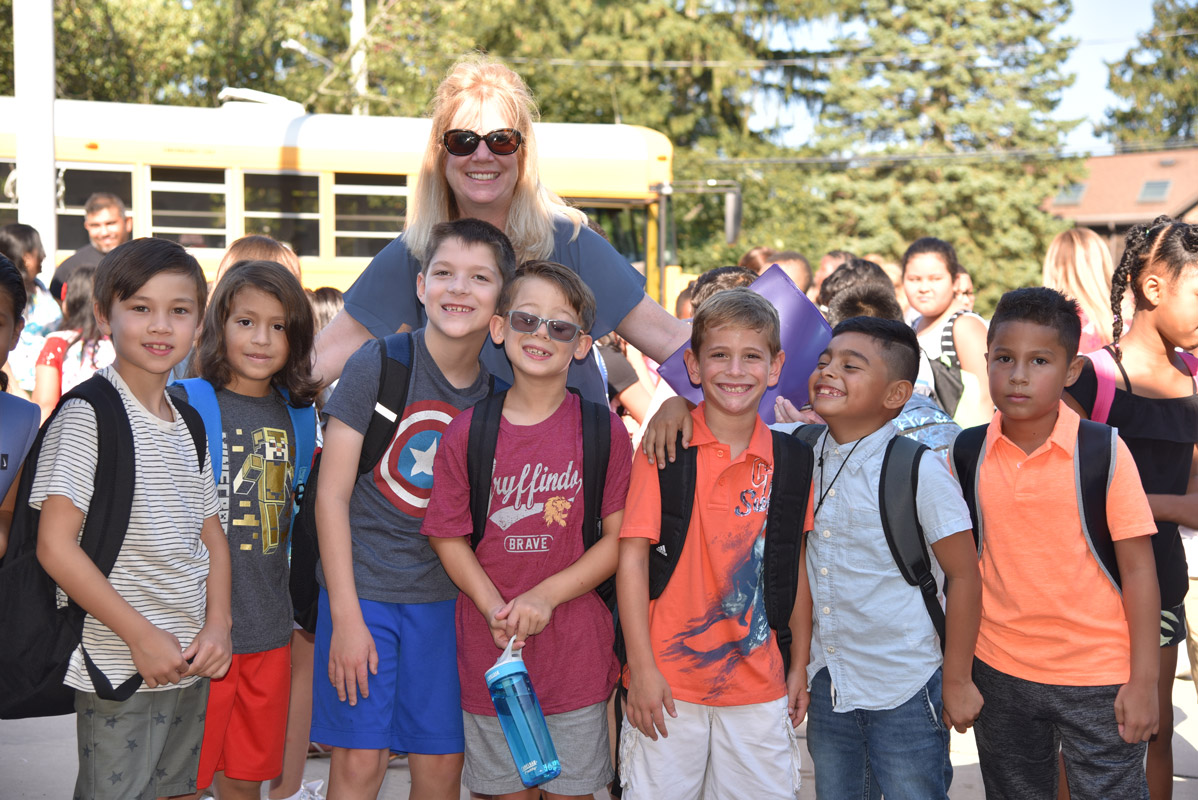 Washington Primary School third grade teacher Suzy Dinehart with some members of her class 