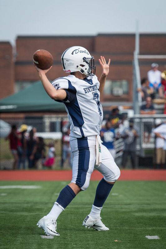 placehoHuntington quarterback John Paci drops back to pass. (Darin Reed photo.)lder