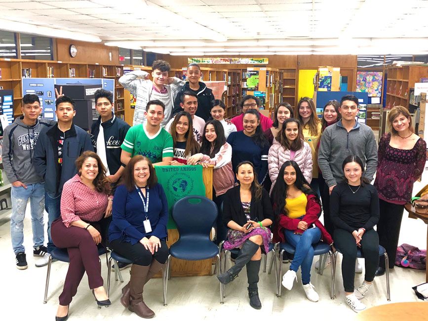 The United Amigos sponsored bilingual poetry reading drew a diverse crowd to the high school library.