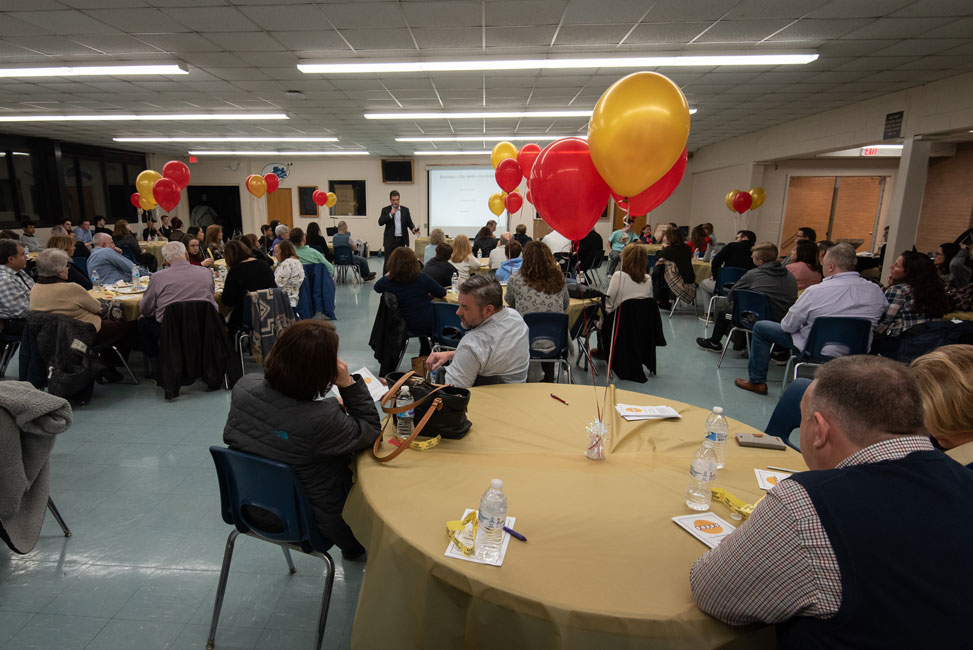 Poppy's networking night fundraiser drew a crowd to the Huntington High School cafeteria.  (Darin Reed photo.)