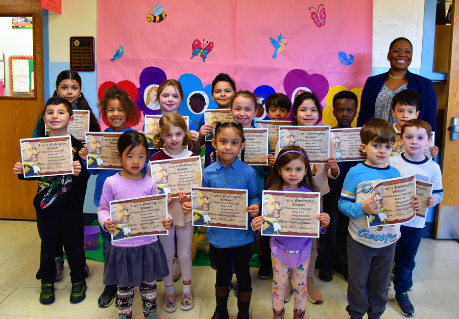 Principal Michelle Richards with Washington Ways Award winners for March 