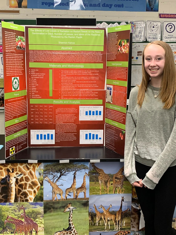 Huntington's Shannon Kehoe with her Malloy Science Fair project.