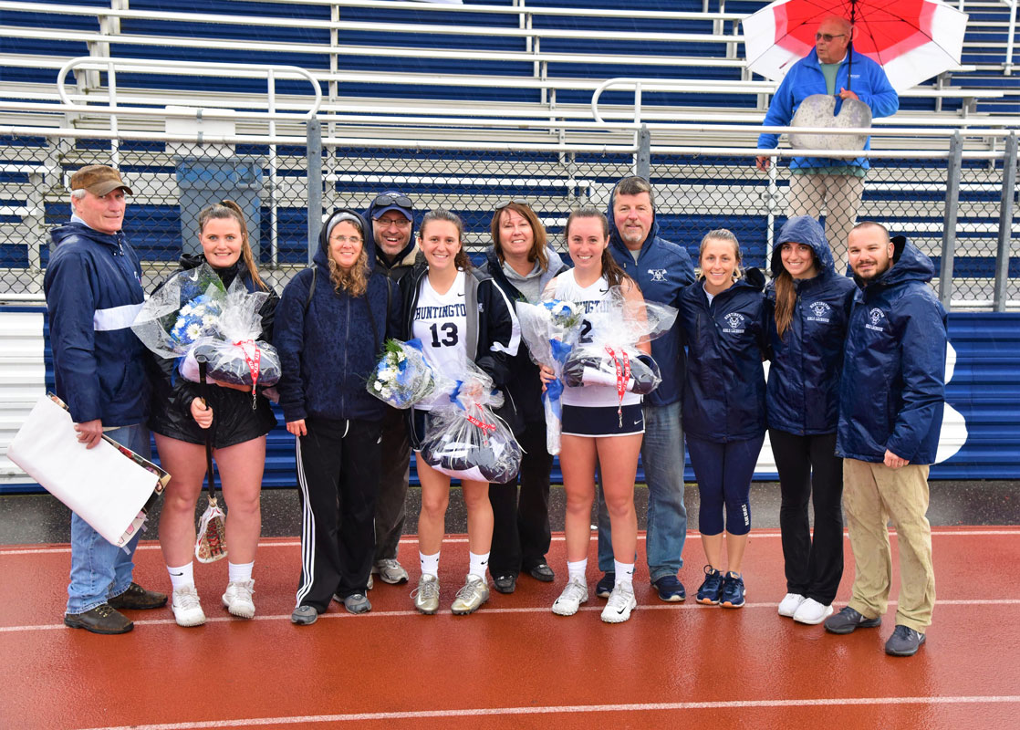The seniors, their parents and the Huntington coaching staff after the Senior Day ceremony. 