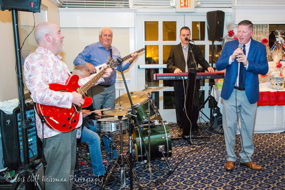 Huntington High School Principal Brenden Cusack performed with the band at last year's gala. (Cliff Weissman photo)