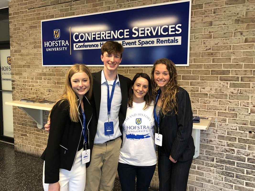 Teacher Lauren Desiderio (second from right) with award winning students Emily Geller, Chris Maichin and Katie Browne.