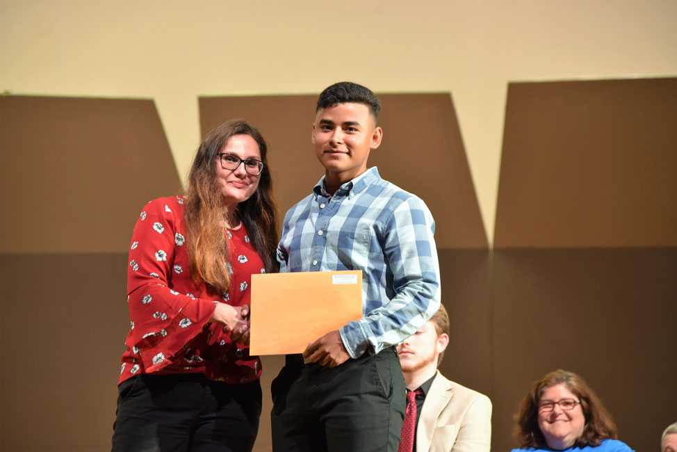 Howard Munson Scholarship Award recipient Edgar Rivas Lizama with Huntington High School guidance counselor Diana Bonilla 