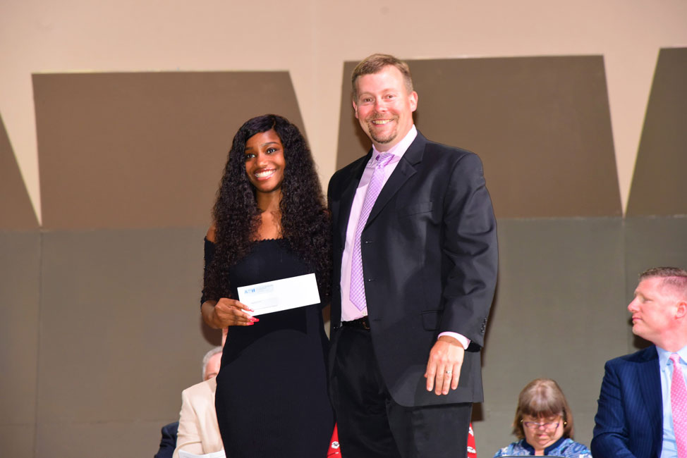 Christine Amodeo Palmer Memorial Scholarship recipient Mackenzie Joseph with ATH President James Graber.