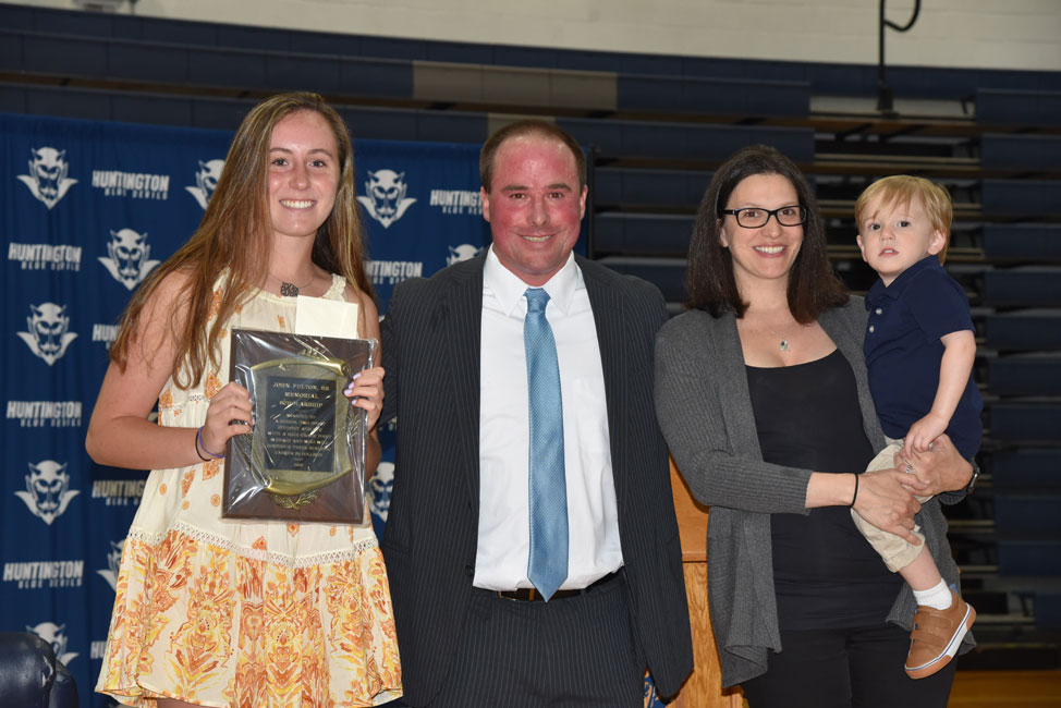 John Fulton Sr. Memorial Scholarship Award recipient Paige Lennon with Fulton family members 
