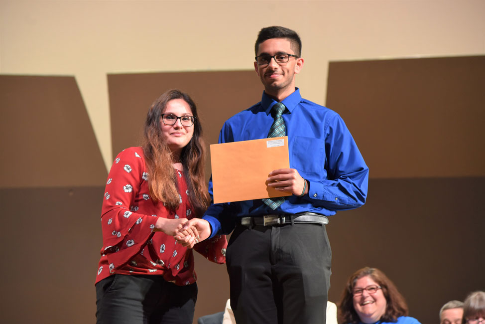 Counselor Diana Bonilla with Honorary Chief Ray Mazoyer Award for Economics recipient Arashdeep Singh (3)