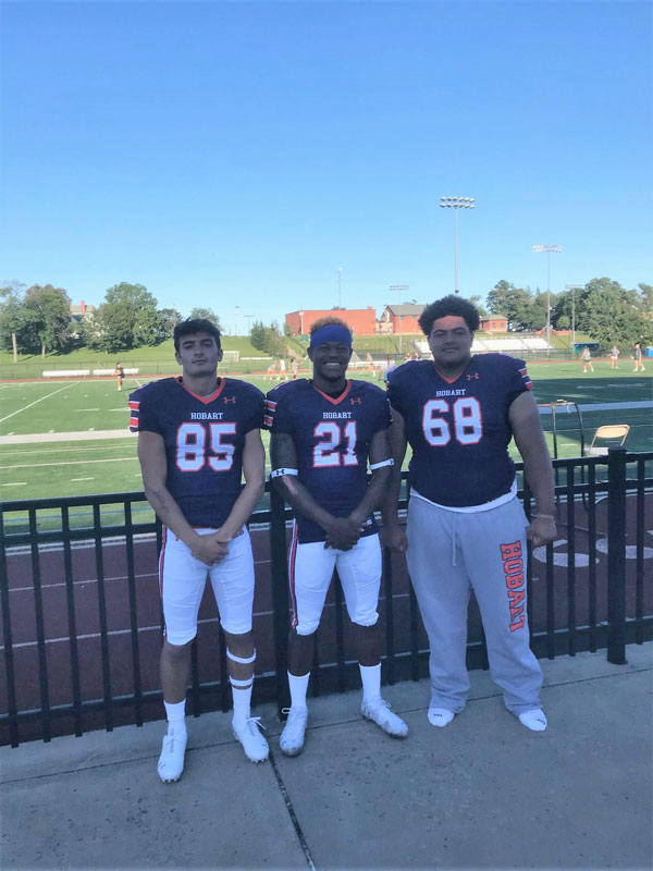 Huntington alums Alex LaBella, Jared Leake and Clay Jamison play football at Hobart College.