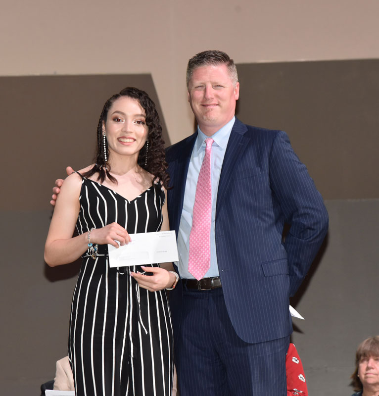  Huntington Principal Brenden Cusack with Jostens Leadership Scholarship Award recipient Ilsi Martinez Euceda  