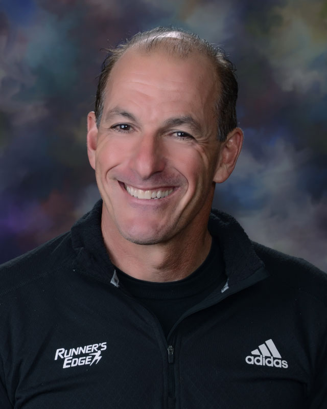 Longtime Huntington tennis coach Jamie Fishlow