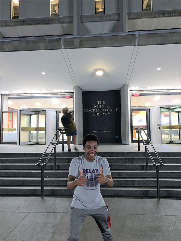 Huntington senior Robert Jean-Gilles outside Brown University's library.
