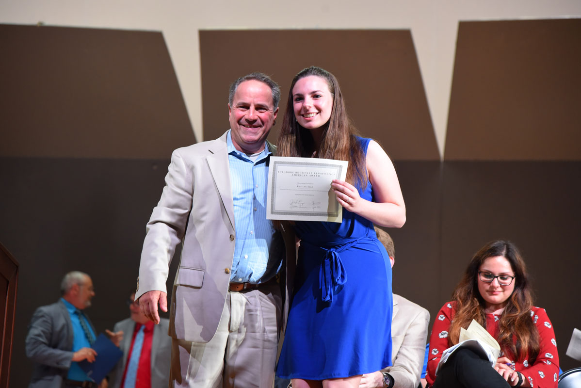 Teddy Roosevelt Renaissance American Award winner Kaitylyn Sage with Chair of Humanities Joe Leavy.